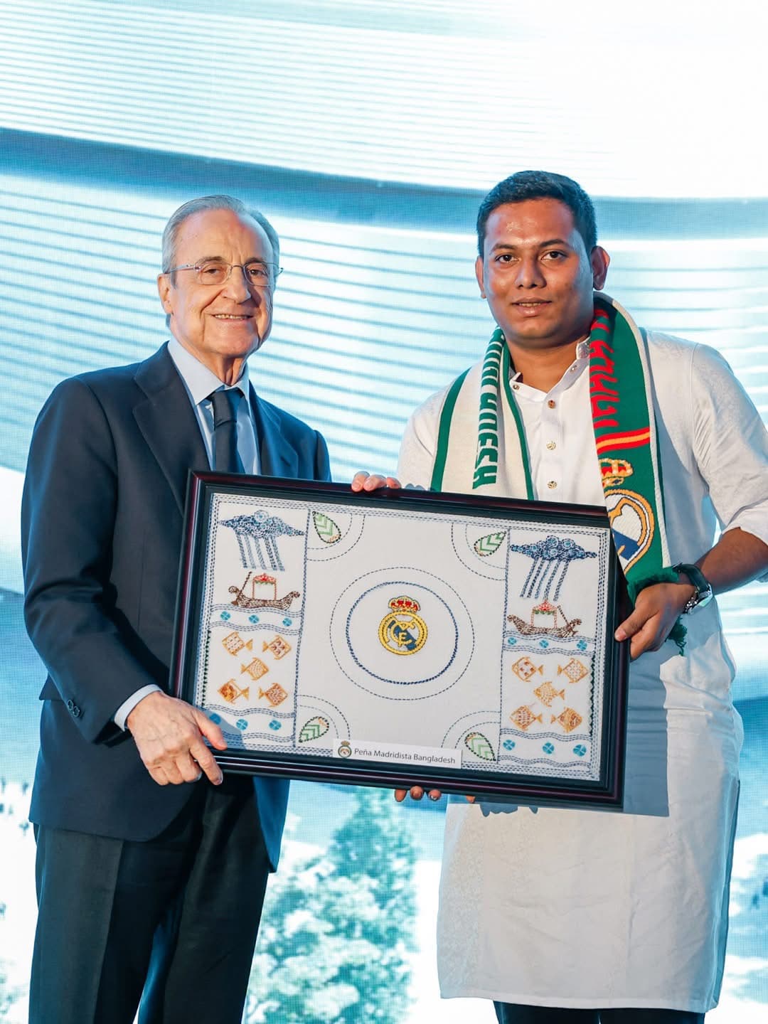 PMBD representatives presenting a nakshi kantha to Real Madrid president Florentino Pérez in Jeddah