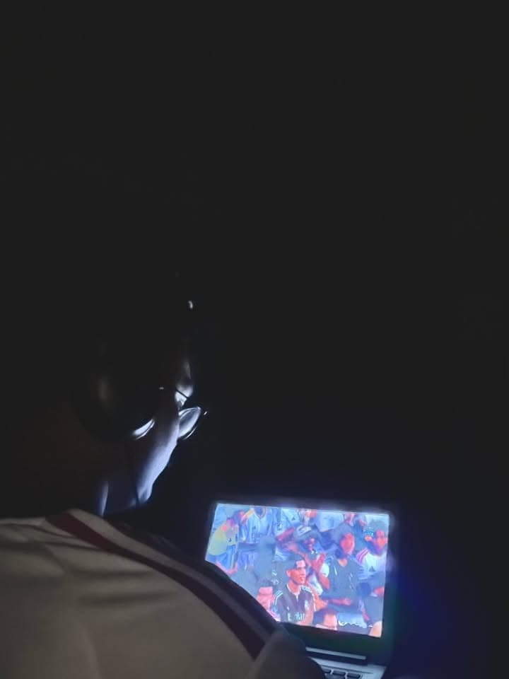 A PMBD member watching a Champions League match alone on a laptop late at night